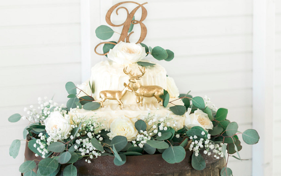 cream wedding cake and gold cake topper for cream gold rustic elegant wedding
